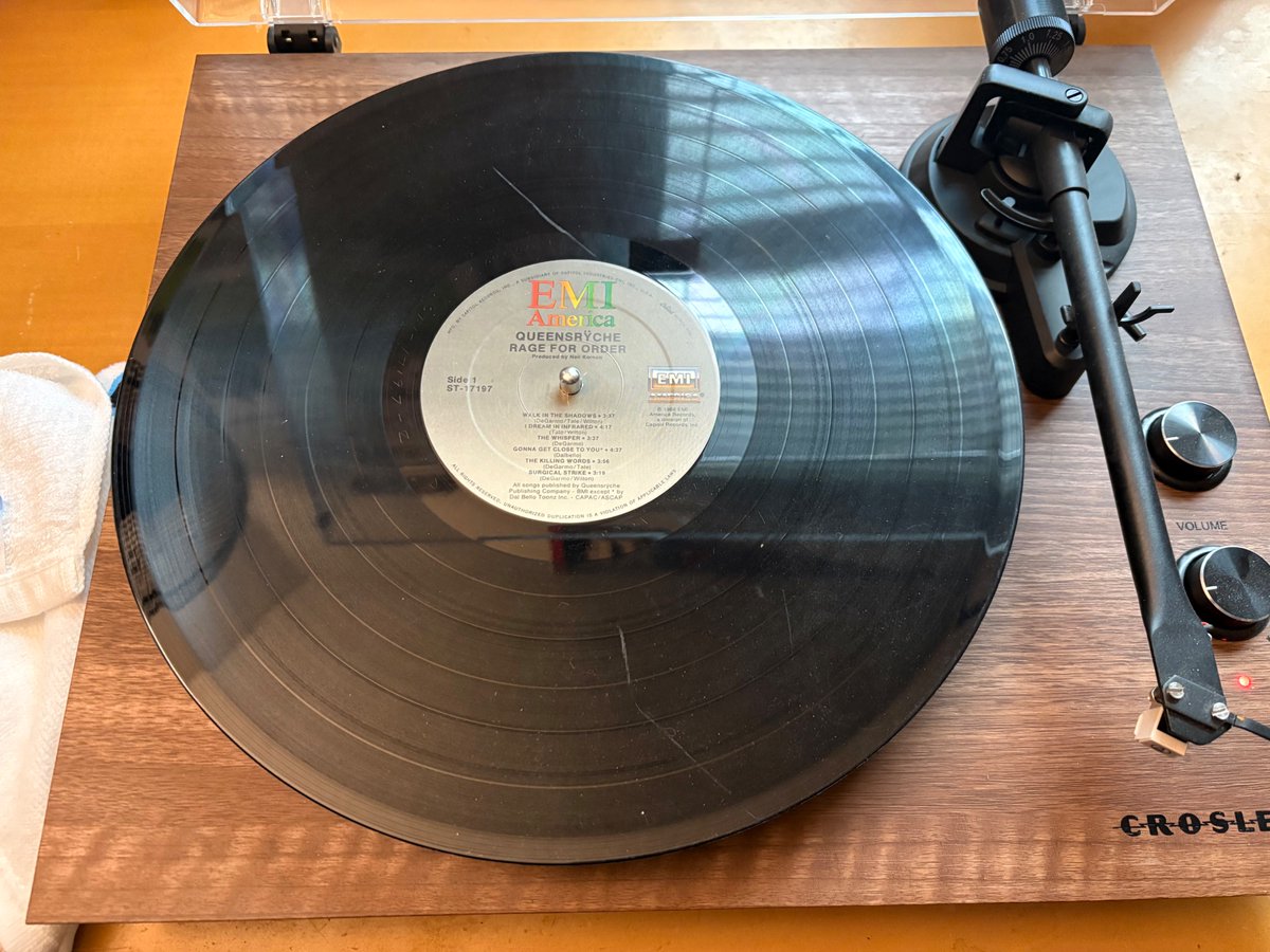 sabbathfans's tweet image. First vinyl spin today because a friend played his yesterday - "Rage for Order" by @queensryche. Was my first ever QR buy. Forgot mine has two large scratches (&amp;amp; is a cutout copy), but doesn't affect playing. This is my OG copy from 1986 still around in 2026! #vinyl