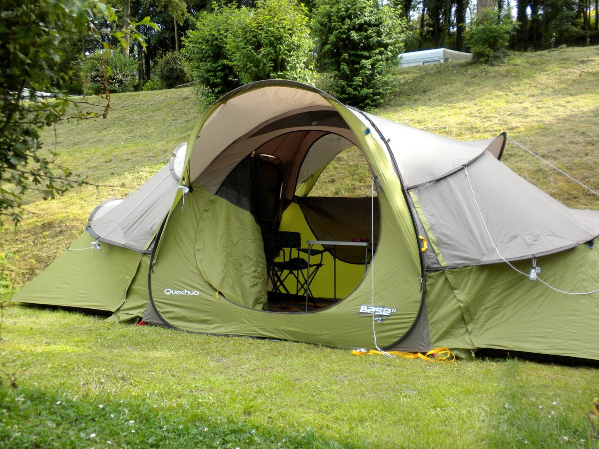Look at these modern existential cocoons called "tents". The camper craves metamorphosis, but emerges every morning the same bug