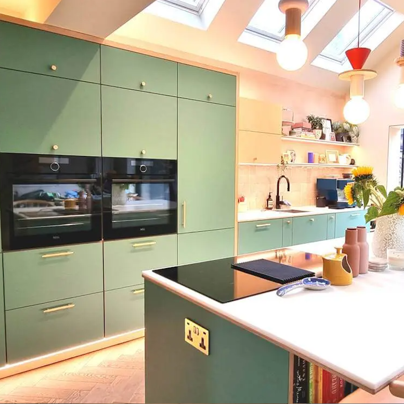 Green FENIX NTM, birch plywood core construction and a clean open plan layout tailored to the room.

This Leeds kitchen case study shows how a fully bespoke approach makes it possible to combine modern minimal lines with practical storage, integrated appliances and durable