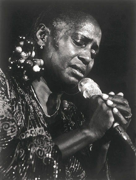 Miriam Makeba sweats with emotion as she performs in Lesotho, 1981. Credit: Through My Lens/Alf Kumalo