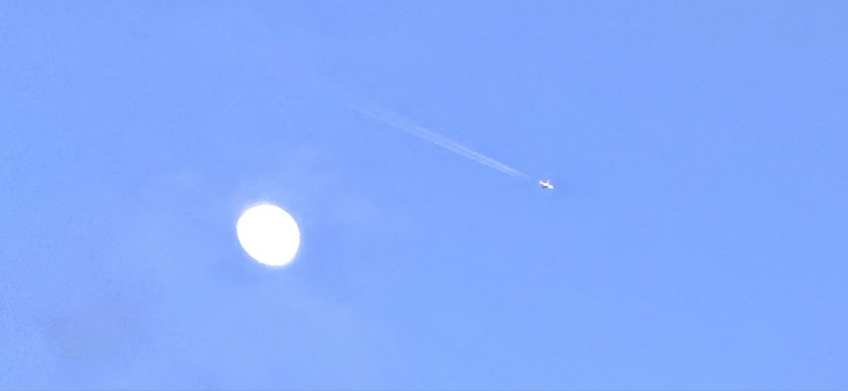 jonimarielew's tweet image. While taking a pic of the moon, a plane flew by.  #moon #plane #clouds #Nevada #desert