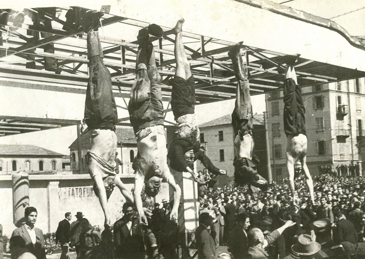 USAS_WW1's tweet image. #OTD #TacoTuesday #Nazi #Fascism: April 28, 1945. Right wing Fascist Italian dictator Benito Mussolini and his mistress executed by Lake Como and later hung upside down at a Milan gas station. April 30: his Nazi fascist disciple Adolf Hitler joined him in death and Hell...