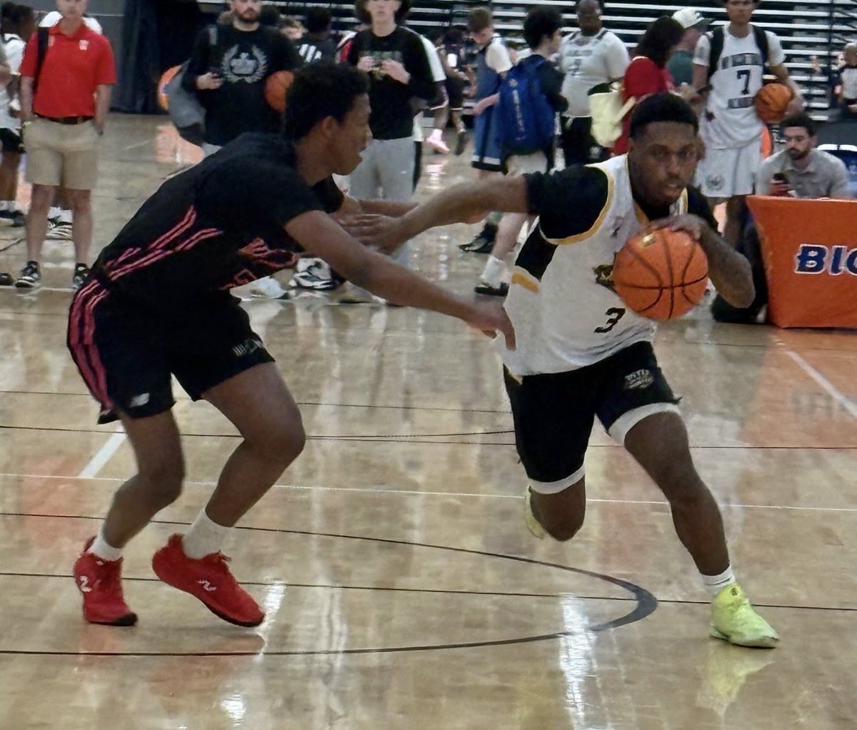 NorfolkKnights's tweet photo. Vito Showcase 5’11 senior guard Ean McLaughlin leads the 17U Slam Orange Division in scoring at 22ppg as we head into Title Sunday!  The fleet footed and shifty playmaker and Riverdale Baptist 1,000 point scorer takes advantage of his powerful legs and use of abrupt stops and explosive starts, ability to change directions in the blink of an eye and explosiveness to blow by defenders in a flash.  He has a quick, tight handle featuring crossovers and in and out dribbles and his powerful frame allows him to use contact effectively.  Ean mixed in crafty drives to the rim where he scores it and creates for others with the ability to knock down shots off the bounce at a high rate.  He hits steps backs and dribble pull-ups and his space creating footwork coupled with quick gathers into the jumper and his explosiveness off the bounce nakes him so difficult to defend.  Ean holds a Livingstone offer and remains one of Maryland’s top available point guards.  He scored 33 points to lead Vito Showcase to a win over Pure Basketball 2027 late yesterday.   See our observation while watching him in action yesterday.  #BigShots #RichmondJam @BigShotsToday @BigShotsGlobal