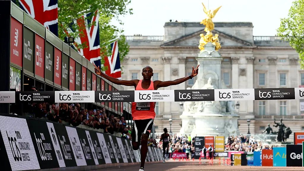 ubctvuganda's tweet photo. UPDATE: Kenya’s Sebastian Sawe wins the London Marathon in a record 1:59:30, becoming the first man to finish it in under two hours. Ethiopia’s Yomif Kejelcha finishes second in 1:59:40, while Uganda’s Jacob Kiplimo places third in 2:00:28. https://t.co/QlnonPlS3m