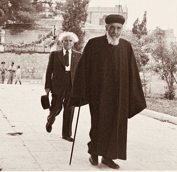 Sephardi Chief Rabbi Hai Ben Zion Uziel walking in front of PM David Ben Gurion to the foundation ceremony of the Hebrew University Medical School, 1951.
