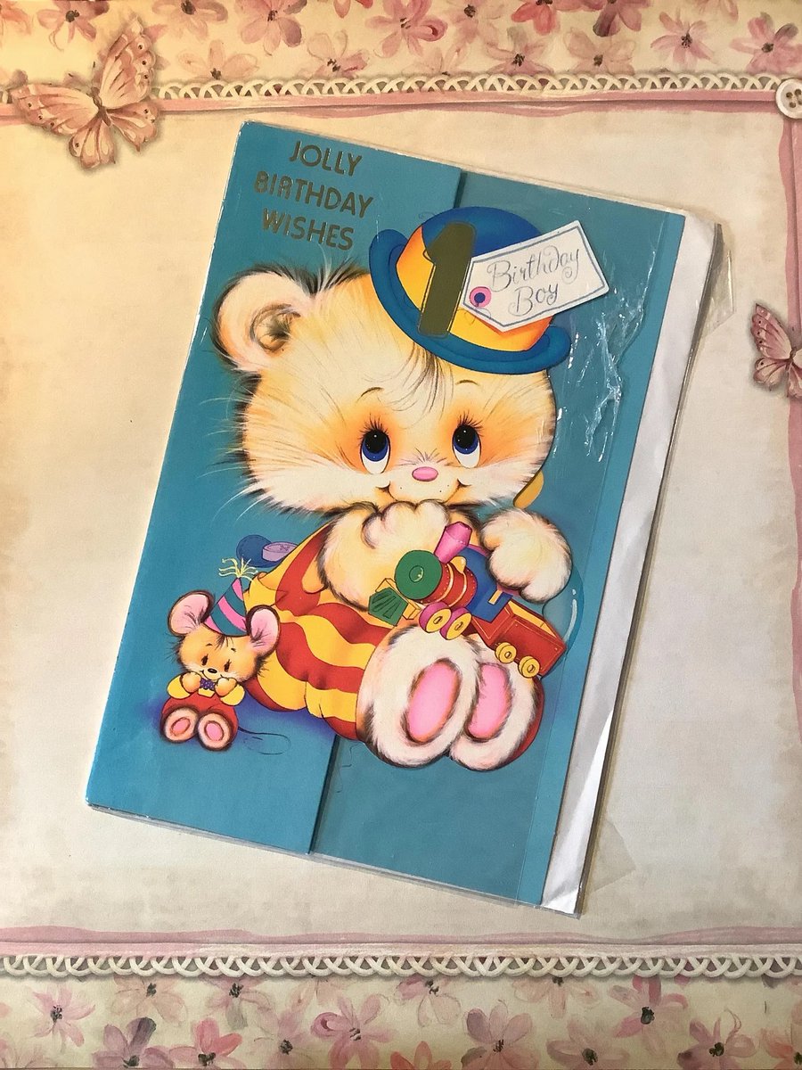 WatsonsVintage's tweet photo. ONLY ONE AVAILABLE! RARE Vintage Circa 1970s 1st Birthday Card for the Birthday Boy - ADORABLE Big Blue Eyed Cat holding a Toy Train and Mouse Design https://t.co/s85pyvrJ3A via @Etsy #VintageCards #BirthdayCards #1stBirthday #FirstBirthday #kitsch #TraditionalCards #CatDesign https://t.co/8E00nCIZLc