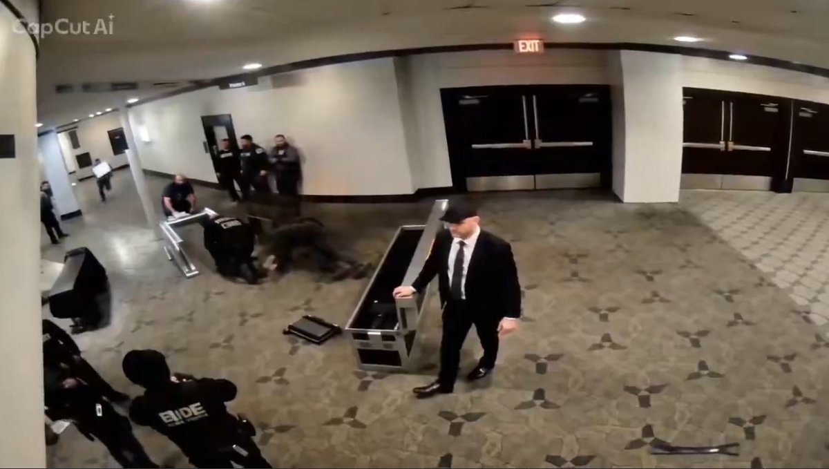 BodOfEvidence's tweet photo. @bennyjohnson I found multiple oddities in this video. First, the giant white sign the suspect holds disappears in a frame. Then the guy in the middle of the frame wears a ballcap which turns into a do-rag. https://t.co/IL7d1kbL4F