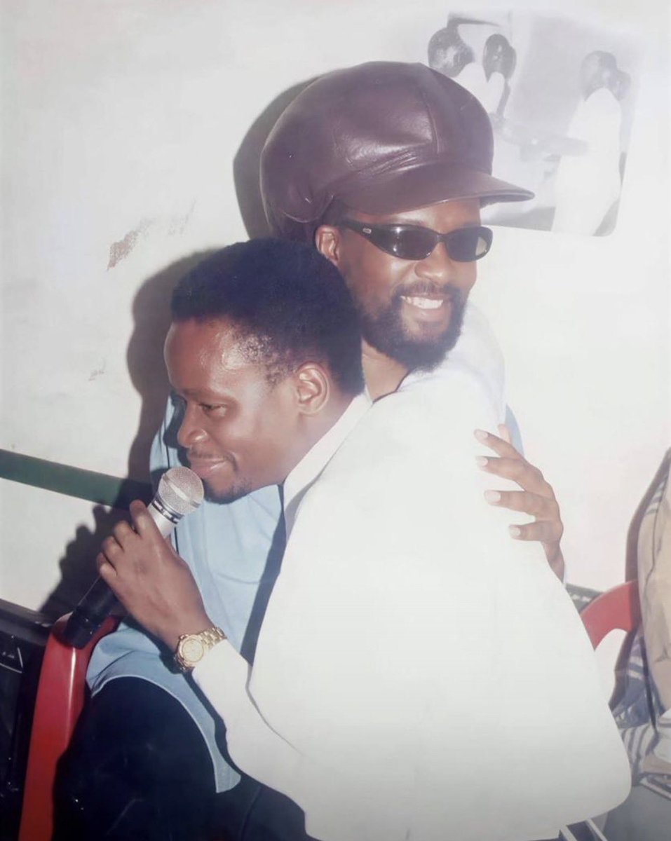 Paul Job Kafeero and Lucky Dube share a light moment in 2003
