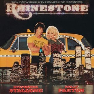RetroCoast's tweet image. Rhinestone was a 1984 movie starring Sylvester Stallone and Dolly Parton

Despite two of the biggest stars of the Eighties the movie didn't do well and is forgotten today.

Did you see it? #1980s