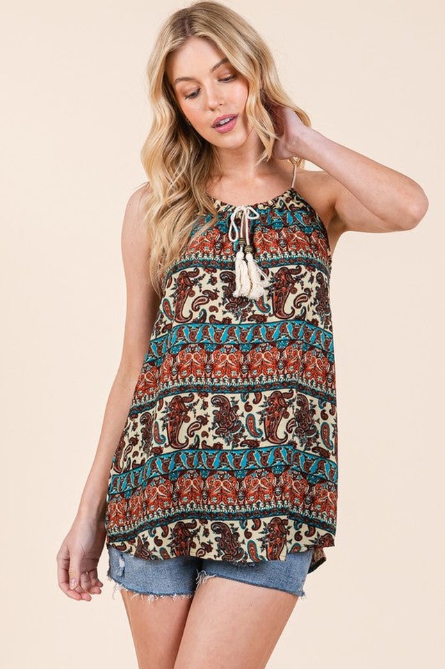 amomentofnow's tweet image. Tassels + tribal vibes = the perfect summer top 🍃 Go boho chic with our new sleeveless woven top. The front tie detail? Chef's kiss. Lightweight rayon fit for scorcher days. Try It now at amomentofnow.com/products/front… 🔥 #BohoStyle #SummerFashion #TribalPrint