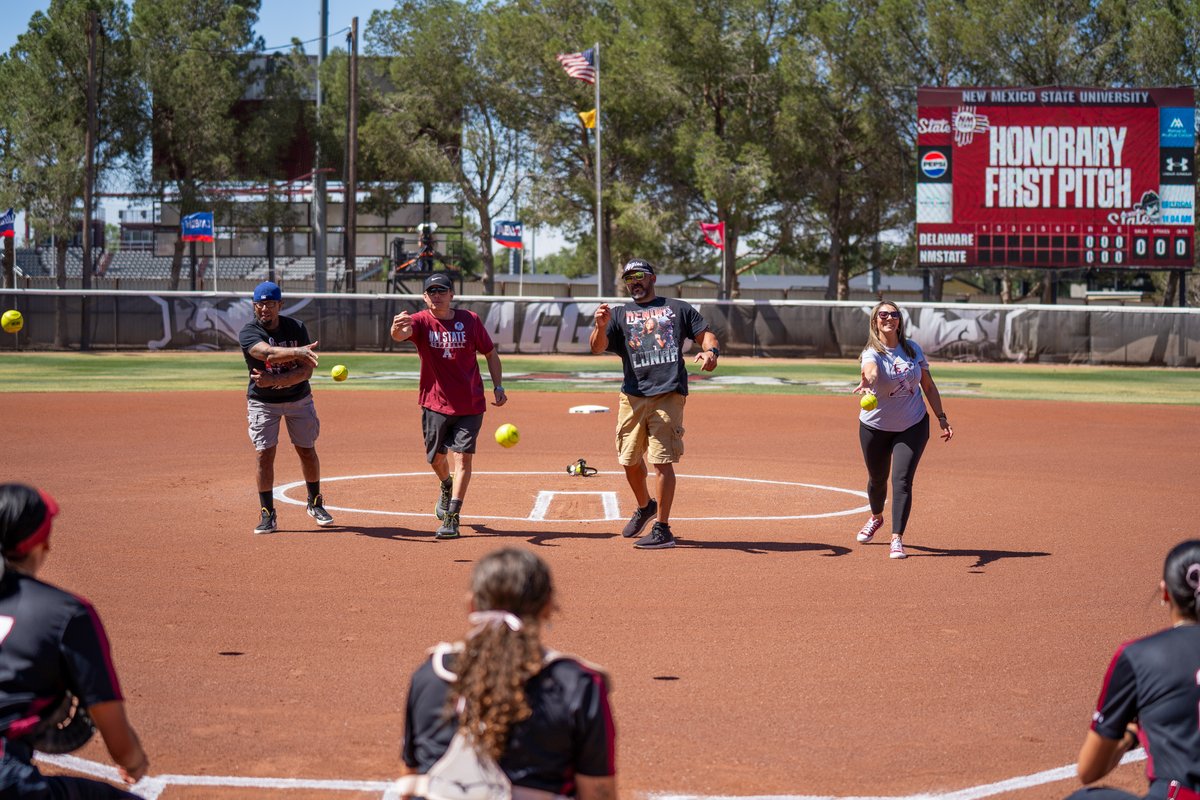 NMStateSoftball's tweet photo. So much love for the parents who helped make this journey possible. First pitch honors on Senior Day. ❤️

#AggieUp https://t.co/FgmtcKeyLf