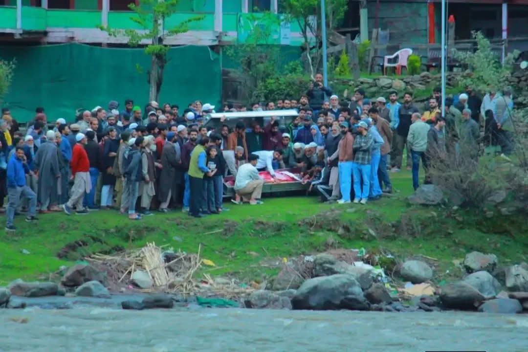 The coffin was brought to the eastern bank of the Neelum River in Keran village, 😢 In divided Jammu and Kashmir, not only families remain separated, grief and final rituals are divided as well.