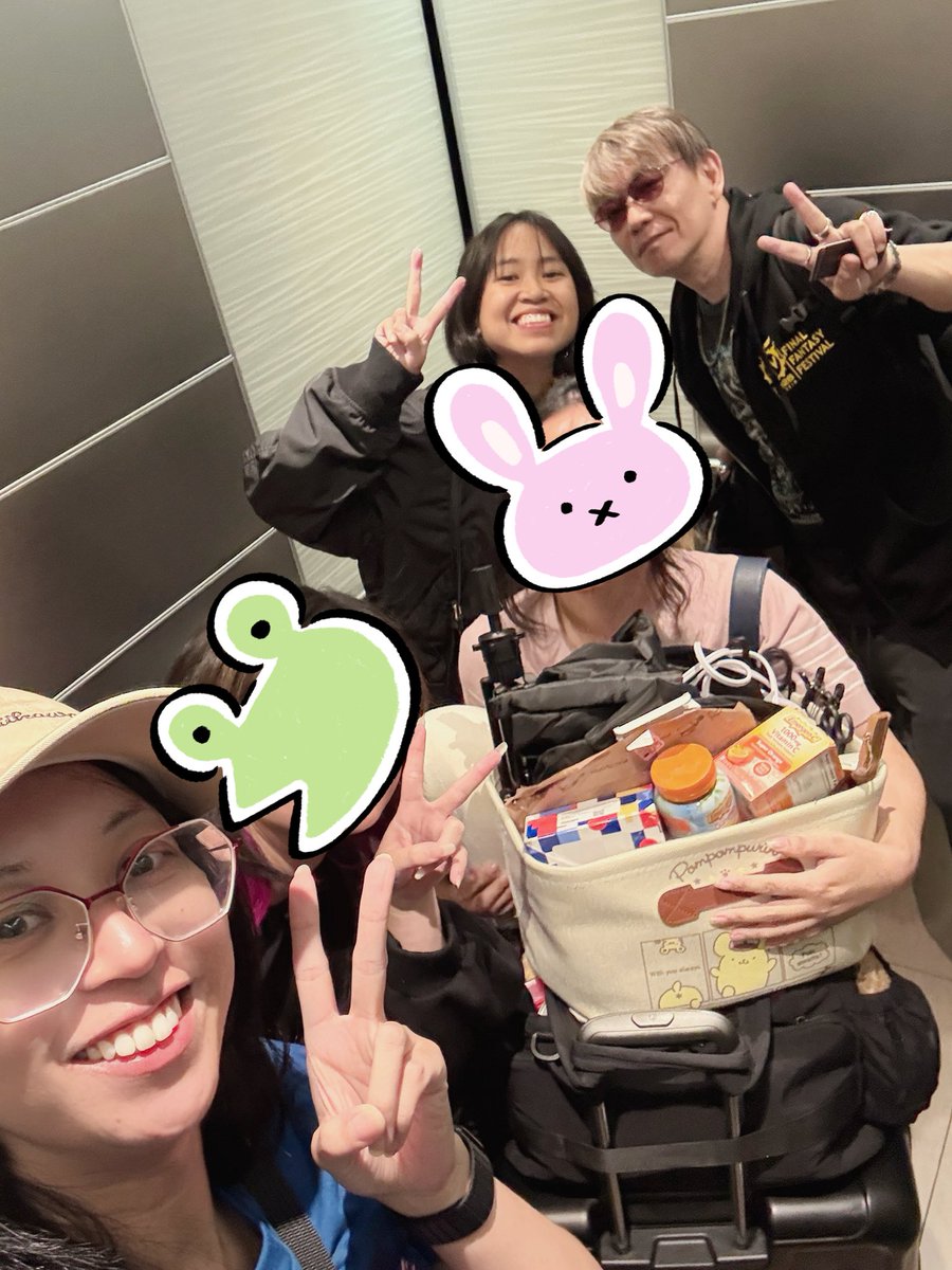 THICCSUCCYNN's tweet photo. Best ending to FFXIV Fanfest 2026, checking out of our hotel with YoshiP in the elevator!  #ffxivfanfest https://t.co/eMZPJ40ATW
