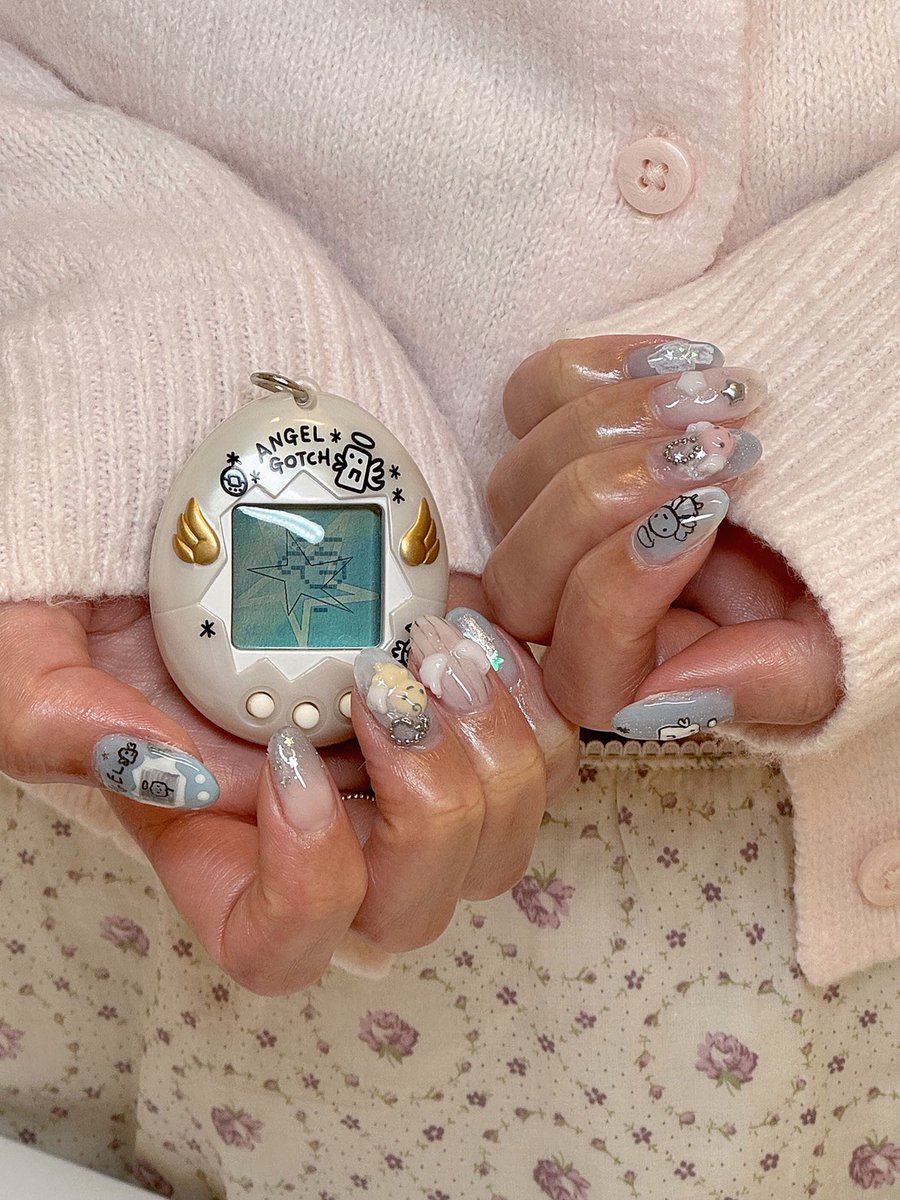 peachypath's tweet photo. angelgotchi tamagotchi nail set my bestie did for me !!! ♡☆♧ https://t.co/xtEdjN2q2u