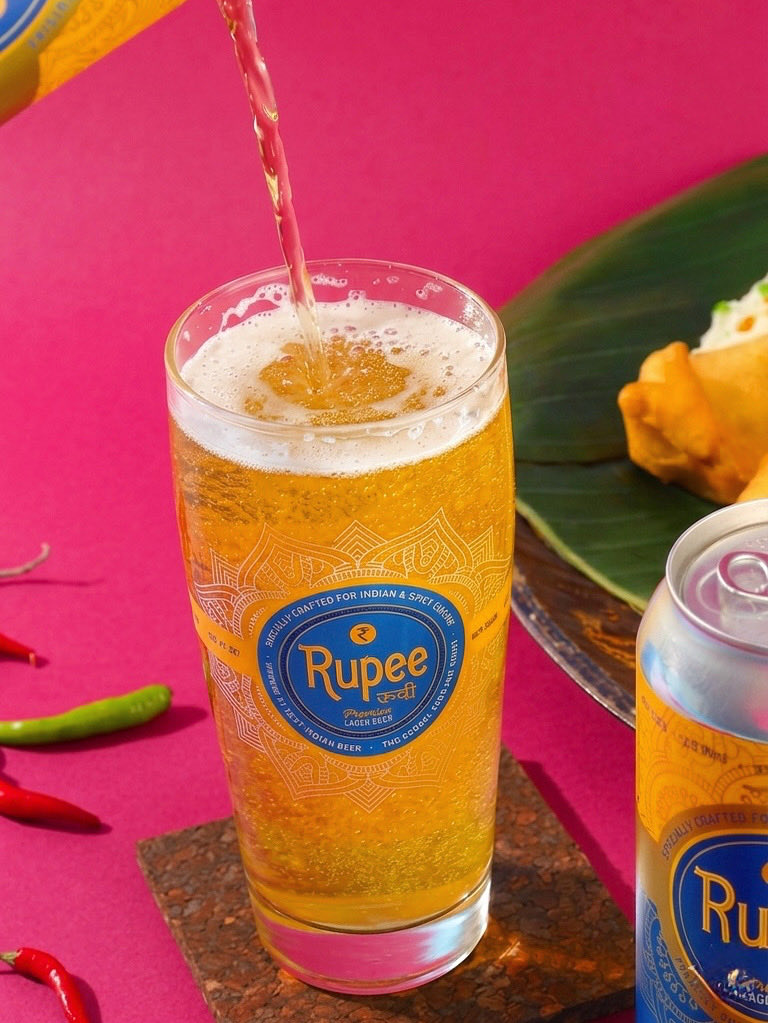 rupeebeer's tweet image. 'Clean. Crisp. Crushable. The most loved rice lager in the game'🍺🍚🔥

#basmatiricelager #wortheveryrupee #beer #lager #indianbeer #beerandfood #beerlover #crushable #lightbeer #ricelager #rupeebeer