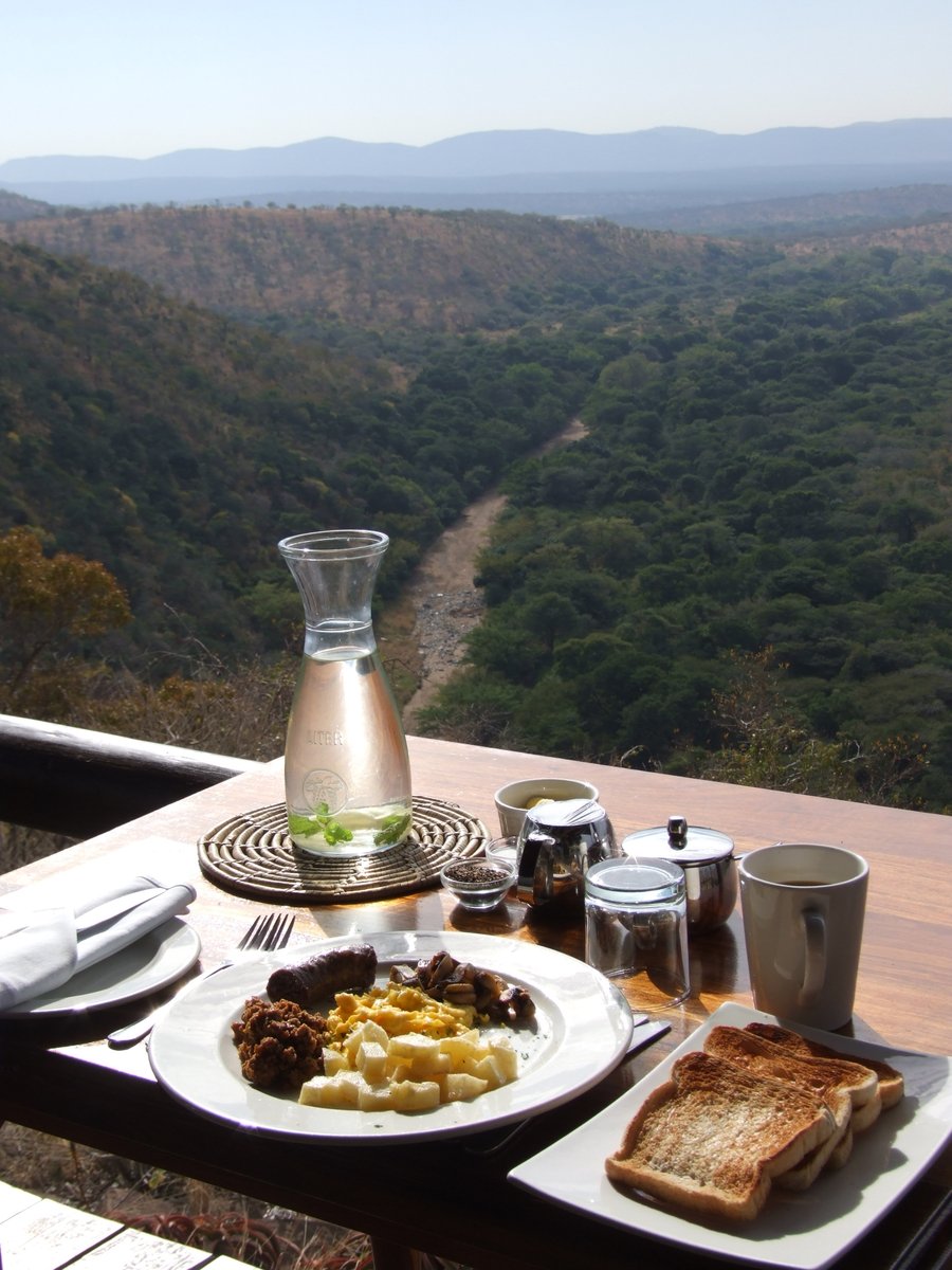 SafariKZNMark's tweet image. One of my many #BreakfastVibes  memories. A full #southafrican complete with mince &amp;amp; view. Are you ready to create your very own #mondaymemories here? Talk to us &amp;amp; lets make a plan to get you there. #safari #wildlife #holiday #southafrica