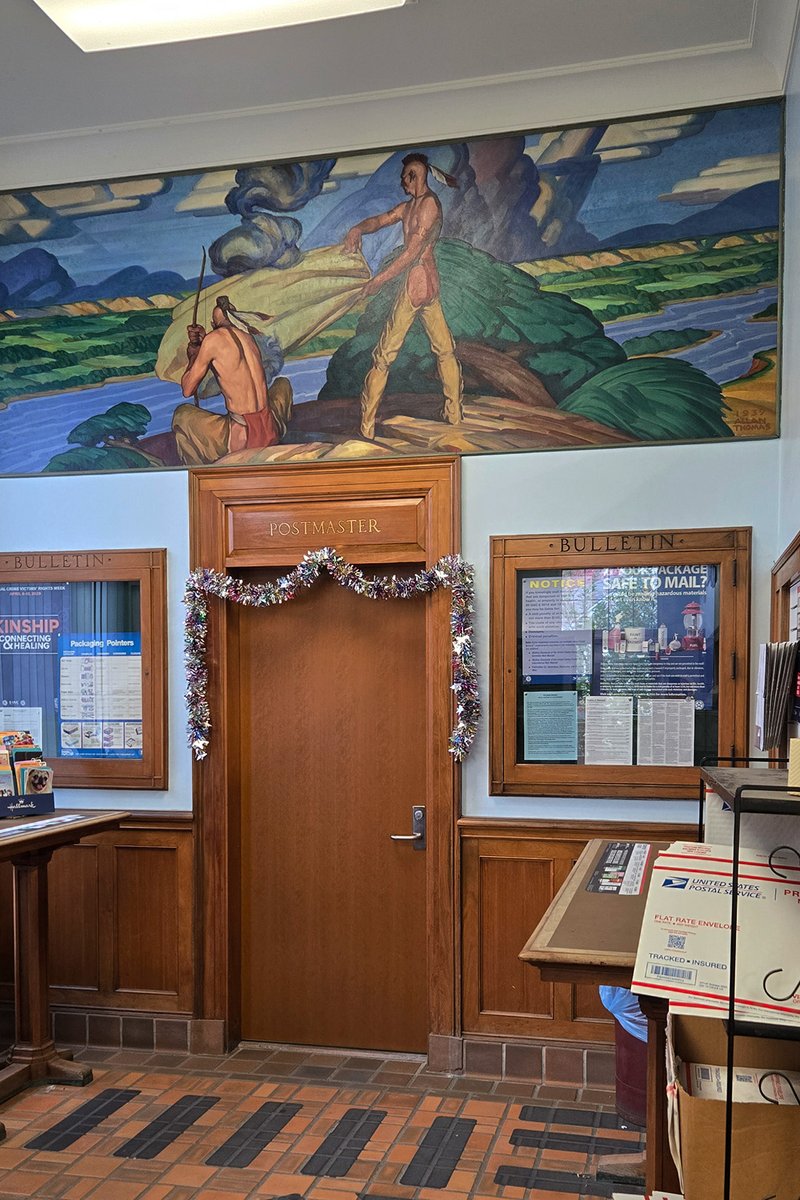 zenwarriorberet's tweet image. Above the door to the #postmaster #postoffice painting of #Native men overlooking river #WPA art from #depressionera