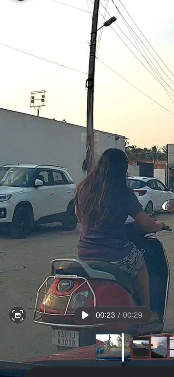 Nischu_7's tweet photo. No helmet, smoking, headphone on, sudden right turn, no remorse after hitting my car, just fled the scene... @blrcitytraffic @BlrCityPolice Can you please take action? No consideration or fear for traffic rules is dangerous.

#blrstories #blrcitytraffic #bengaluru #bangalore # https://t.co/zYpLTxS7TN