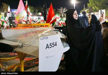 samira74k's tweet photo. @FT The legendary Shahed 136 drones are on display as patriotic crowds gather in Iran's northwestern city of Tabriz to show support for Iran's armed forces and leadership against American and Israeli threats. https://t.co/6NMmo2Vk1H
