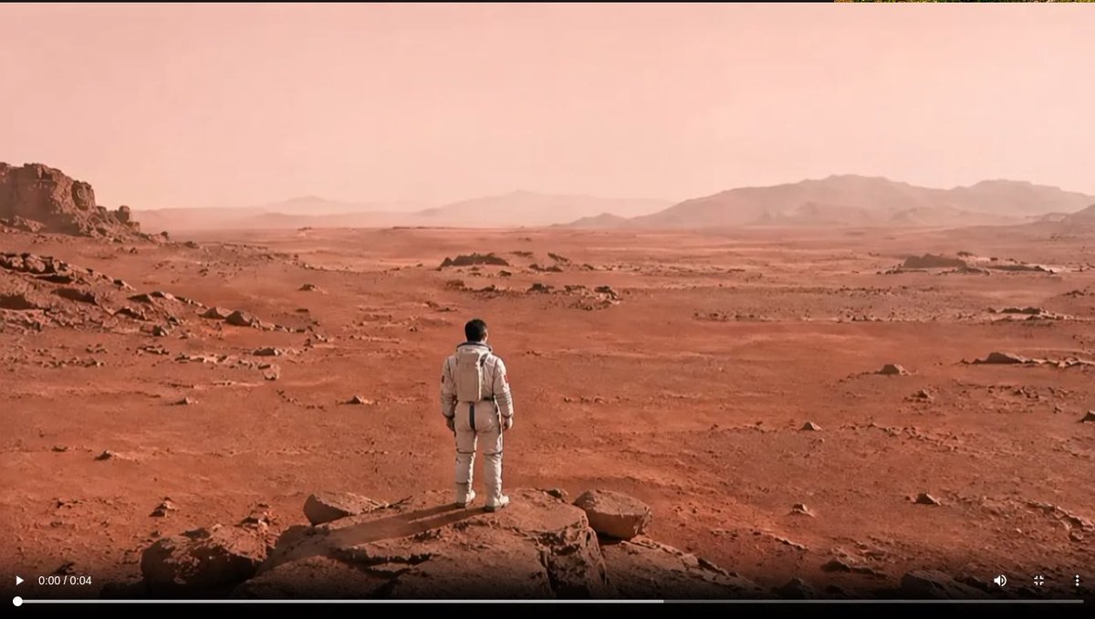 Astronaut on a Red Desert World