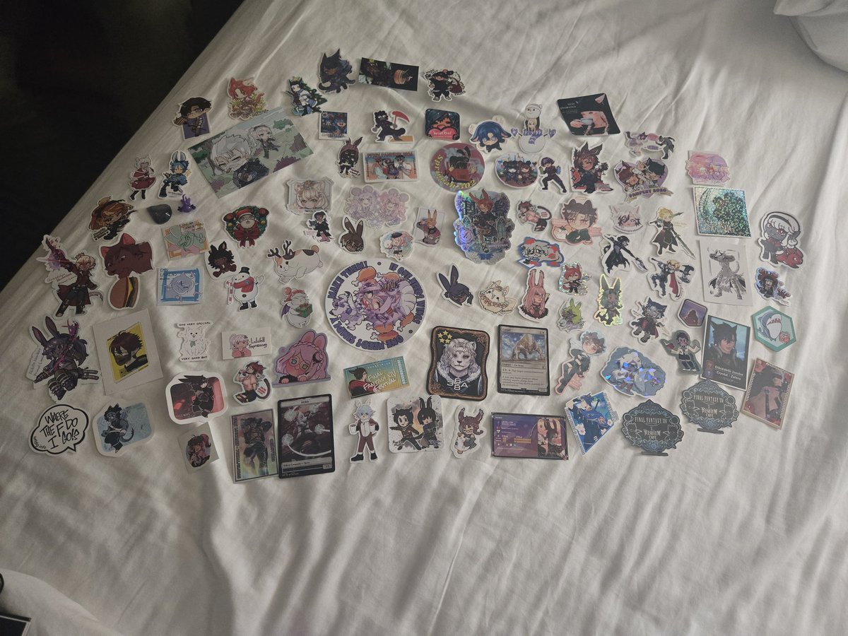 Iythalia's tweet photo. D2 #ffxivfanfest - enjoyed it thoroughly! Next time I'll have to make way more stickers for the #wolstickertrade, I ran out in 10 mins! Met up with jc again to get the mtg token card. So excited for evercold :-) https://t.co/qli6BY0Flt