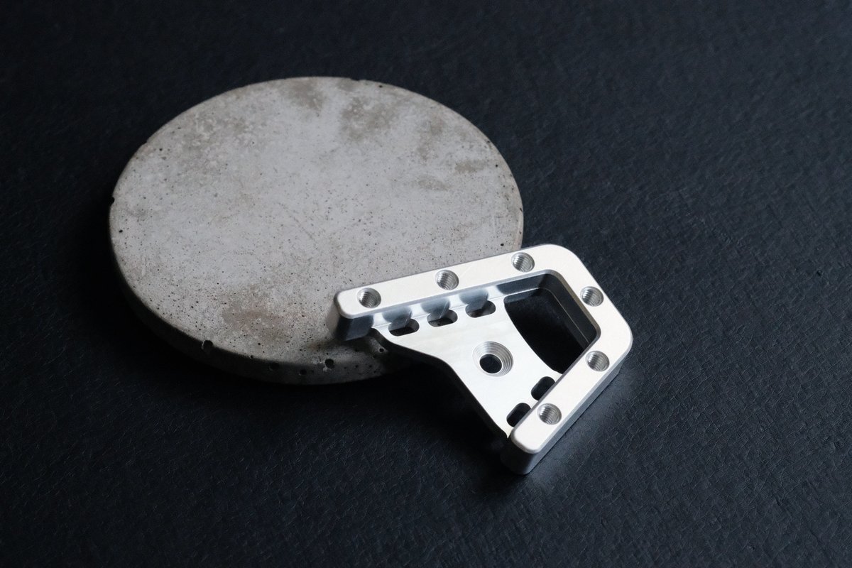 MoonlightLuke's tweet photo. The most complex part I've made on my hobby CNC router so far. It's a motorcycle brake pedal extender/enlarger for use with bulky off-road motorcycle boots. 6061 Aluminum. https://t.co/6NflvzNTZa