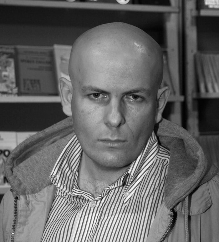 This is a Ukrainian writer and journalist Oles Busina. He was killed in Kiev at the entrance to his apartment house on April 6, 2015.
After the coup of 2014, he refused to leave his native Kiev although he never accepted the coup and the junta that came to power as a result. 
His