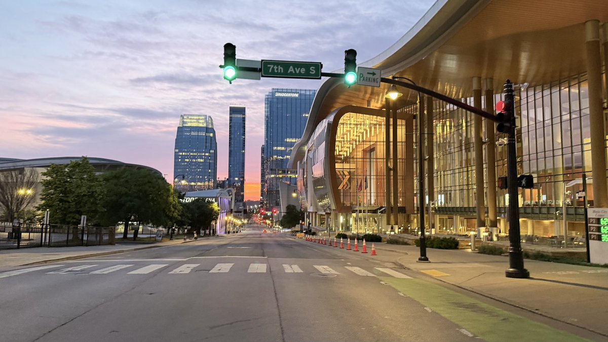 lead230's tweet photo. Early morning view of @musiccitycenter around 6 a.m. this morning as the glow of the #sunrise is visible looking down Demonbreun Avenue in #Nashville 📸 Lee Roberts https://t.co/6dD2TaglzS