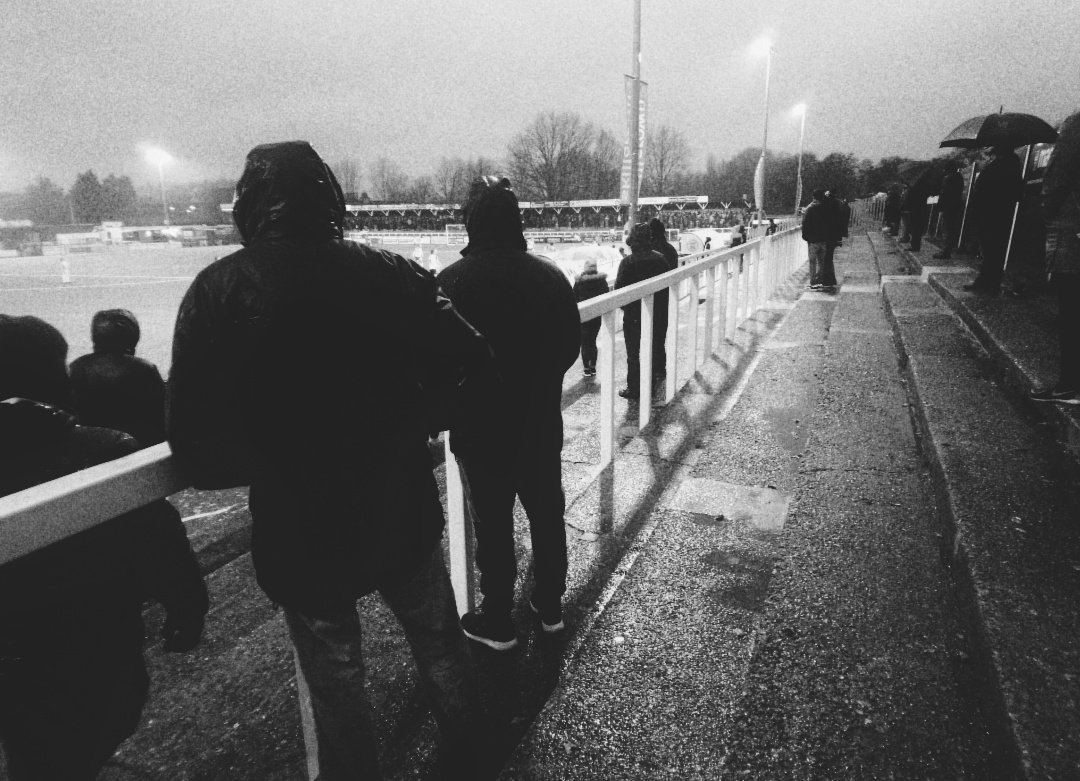 PhotogSmd's tweet image. Only the hardcore stood on the East stand on a rainy afternoon KO, being there helps us appreciate what we've got now 👍
Found this pic on an old phone. 
#progression #goingup #bromleyfc