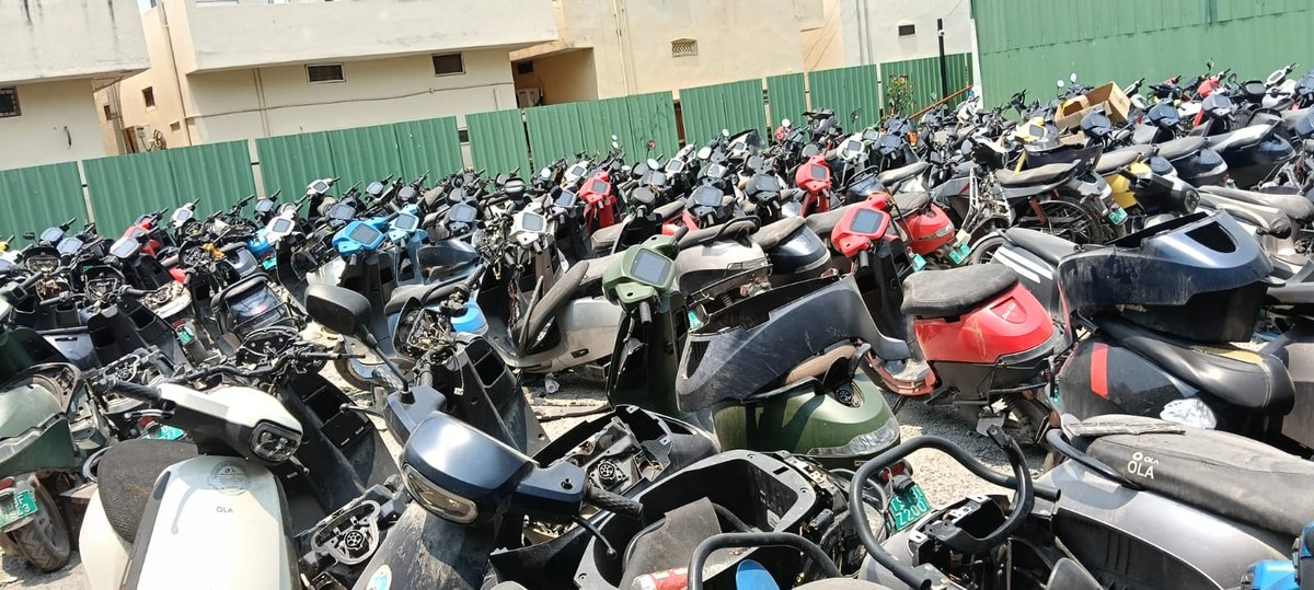 moizpat's tweet photo. @bhash this is the real condition of Ola Nagole service centre 2day, where my scooter was towed on 13 Feb &amp; is still not returned. Piles of abandoned, dismantled scooters everywhere. Is this the future U want 4 Ola customers? Pl return my scooter in working condition immed @OlaElectric https://t.co/03BgqsIkyO