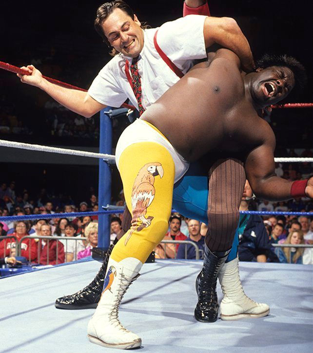 WWFWrestling1's tweet image. 📸 Shot from this day in 1991: Irwin R. Schyster sporting questionable brown tights as he tangles with Koko B. Ware at the Five Seasons Center in Cedar Rapids, Iowa. #WWF #WWE #KokoBWare #IRS