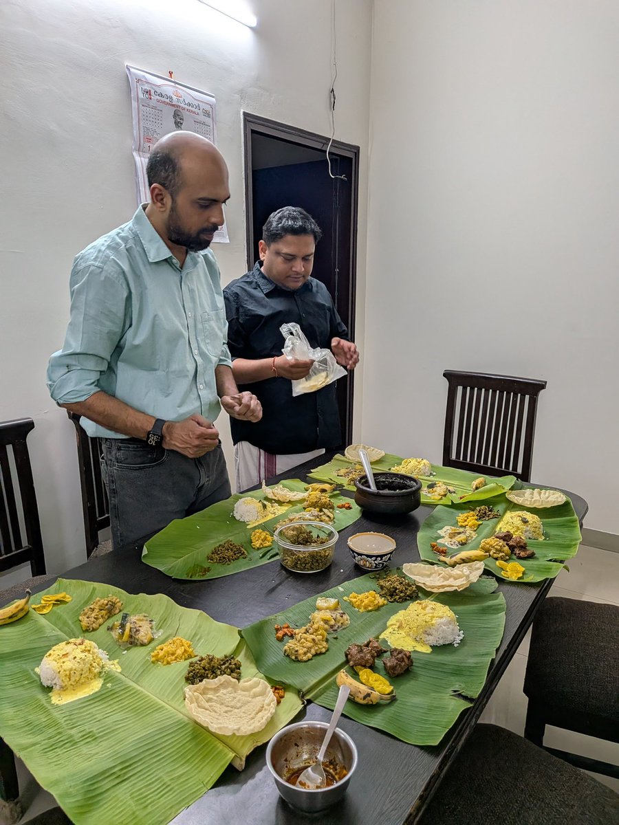 An Odiya &amp; a Bihari - who are Kerala’s son-in-laws - doing a Vishu Sadya spread in Uttar Pradesh. Photo taken by a Punjabi