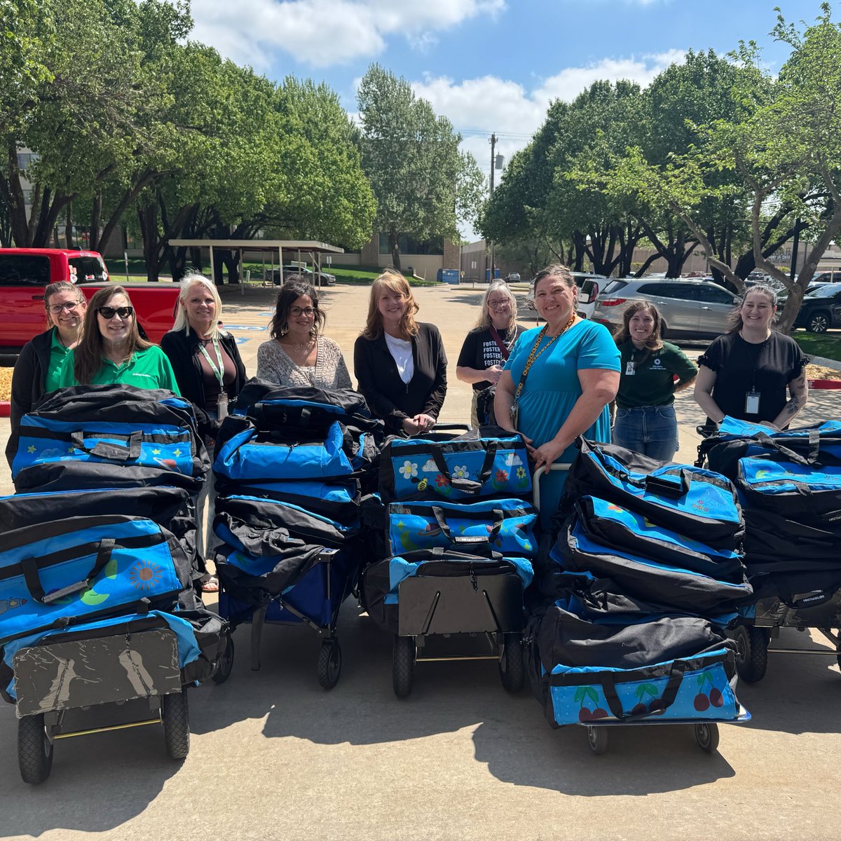 DeltaDentalOK's tweet photo. We are excited to welcome @OKDHS to our office today to collect 120 duffle bags for local foster children. Each bag was loving decorated by a member of #TeamDelta and contains a blanket, teddy bear, oral hygiene supplies, and more! https://t.co/u8LnQ5Z7hR
