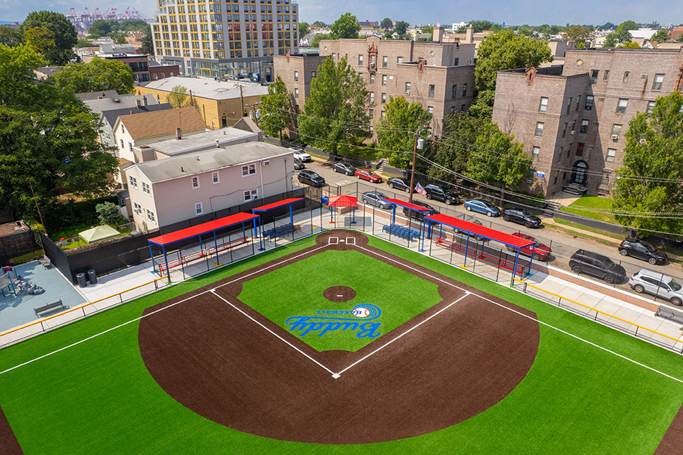 PlayRelaxLive's tweet photo. Field of Dreams at 11th Street Park in Bayonne, New Jersey features five Superior Shelters. Two Dugout Cantilever Shelters shade and protect spectator seating, while our Dugout Shelters cover player's benches. A Mini Shelter was added near home plate for the score keeper. https://t.co/QjqWysbKYF