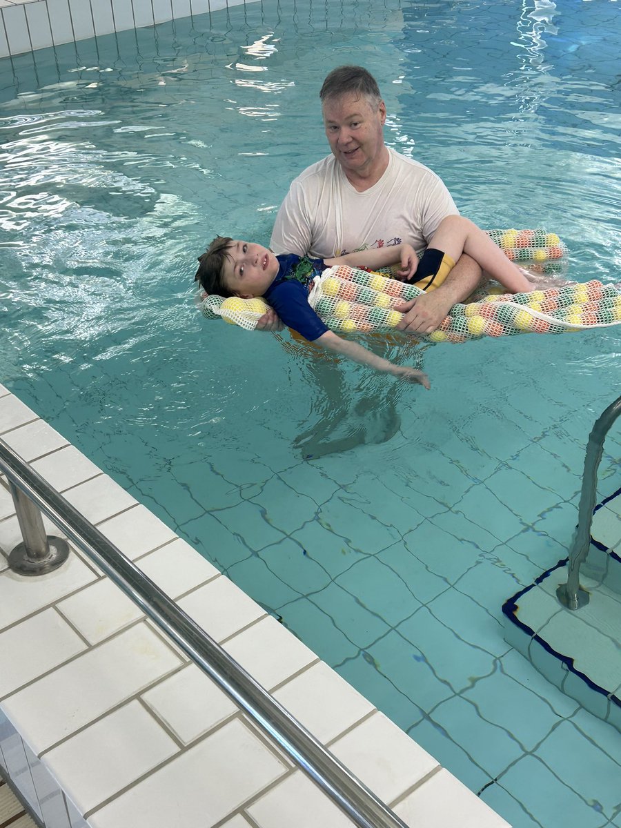 isright's tweet photo. #MoreHydrotherapy: Mummy managed to get another session in the pool today for me. Much needed after yesterday’s longest walk. I just lay on the floating ball mat, in the warm water and let the Old Fella do all the work. Feeling tired, so time to chill before tomorrow’s exercise. https://t.co/zWmytt3Xe1