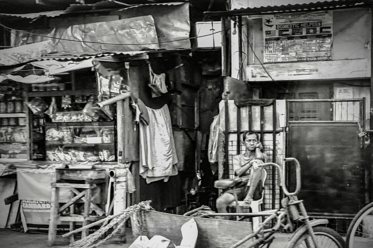 lanceclobo's tweet photo. “The Shopkeeper”  Davao City, Philippines. 2026. L. Lobo https://t.co/Rnvroxv4YU