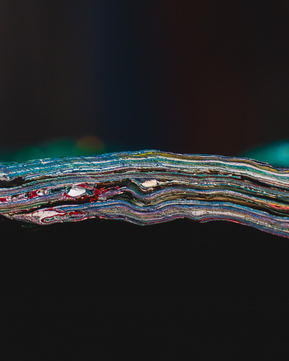 A gift from the Class of 1873, the MSU Rock is a beloved campus monument that has spanned generations of students. Painting it is a Spartan tradition.

When a small piece of its special paint layers fell off, we preserved it and took photos to share.