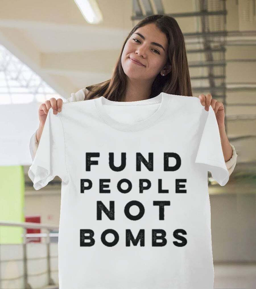 shirtkaya's tweet photo. This one’s been on my mind: the message behind the "Fund People Not Bombs" shirt really resonates. It’s a powerful reminder of what truly matters. https://t.co/SwEvpbbqPI
#ProtestTShirt #FundPeopleNotBombs #SocialJustice https://t.co/S4LdG1pFTI