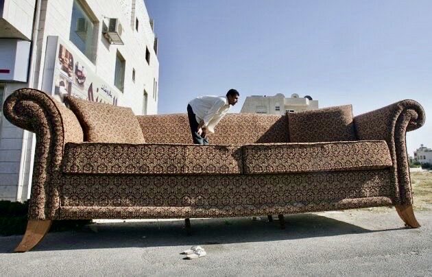 WeirdWhere's tweet image. This is a giant couch built as a novelty roadside installation in Al Khobar, Saudi Arabia—not a famous sculpture, just a deliberately oversized everyday object meant to stand out.

#sofa #saudiarabia #big #art #huge