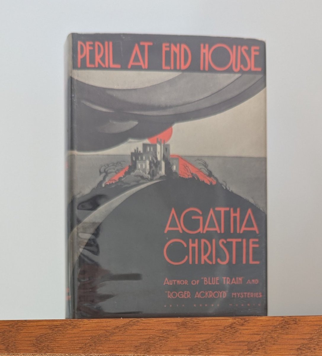 CollectChristie's tweet image. Peril at End House (US 1932 1st ed) by #agathachristie w/ its wonderful art deco cover. One of my favourite Christie's to read. Highlight Quote: "Hercule #poirot is a good dog... if ... there is no scent to follow, he noses around." #firstedition #rarebooks #collectchristie