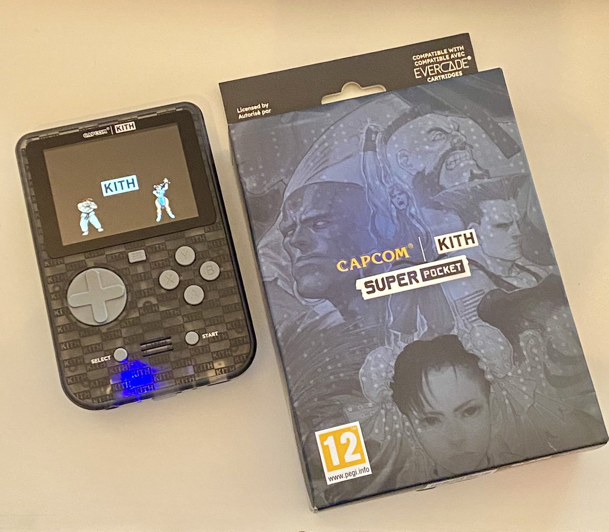 retroguybry's tweet photo. The Super Pocket Kith Edition. It was a long wait but has arrived earlier than expected! #Evercade #HyperMegaTech #Capcom #Kith https://t.co/MwFBO6PdME
