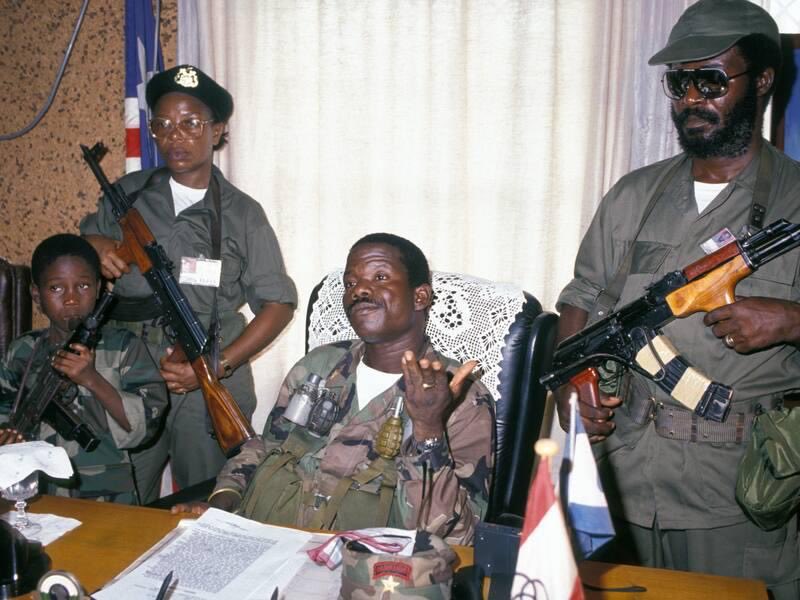 StateDebris's tweet photo. Prince Johnson. In 1990 his rebel group captured President Samuel Doe in Monrovia during the First Liberian Civil War.  Parts of Doe’s interrogation are on YouTube. Not fun to watch. Johnson was slugging beers while it all happened. They cut off Doe’s ear before they killed him. https://t.co/8IWzTx84HC