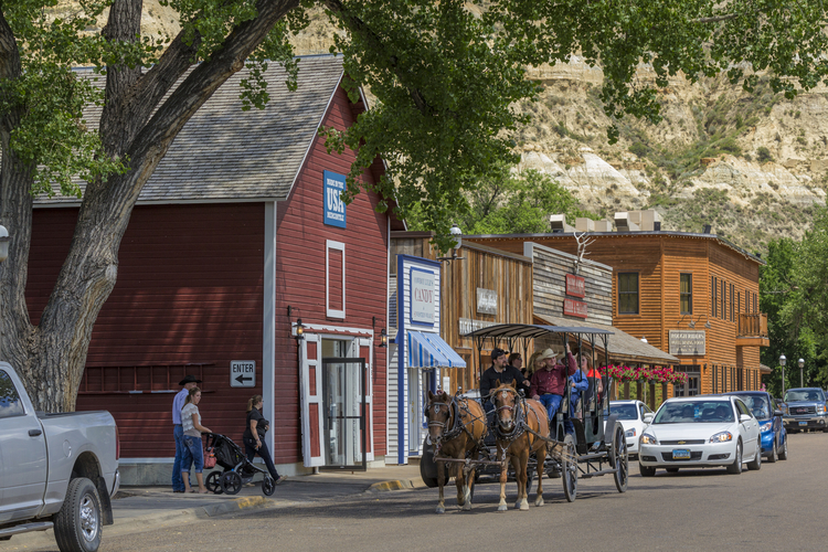 TRPresLibrary's tweet image. If you're thinking about a summer road trip, here's one that actually delivers:

Medora, North Dakota sits at the western edge of the state, right off I-94, at the entrance to Theodore Roosevelt National Park. The town has 121 year-round residents and draws hundreds of thousands