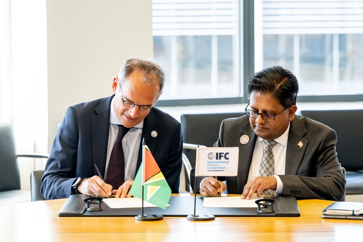 IFC_LAC's tweet photo. The @WorldBankGroup is strengthening its partnership with #Guyana 🇬🇾.

The Government of Guyana and IFC signed the WBG Establishment Agreement—a key milestone to scale private sector development, support job creation, and deepen impact in the country.

#WBGMeetings https://t.co/KplUZpabkm