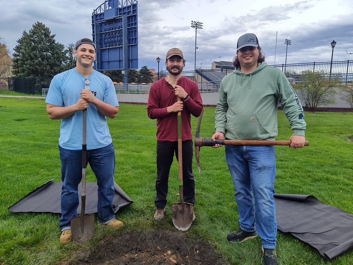 BGCScholarship's tweet photo. Lots of manual work is going into our tree-planting ceremony celebrating 50 years of fruitfulness of the Billy Graham Scholarship Program. We're leaving five beautiful trees on campus. Thank you, landscape crew! Join us on Friday, April 17th at 4:30 PM. https://t.co/MM6t6A6VRv