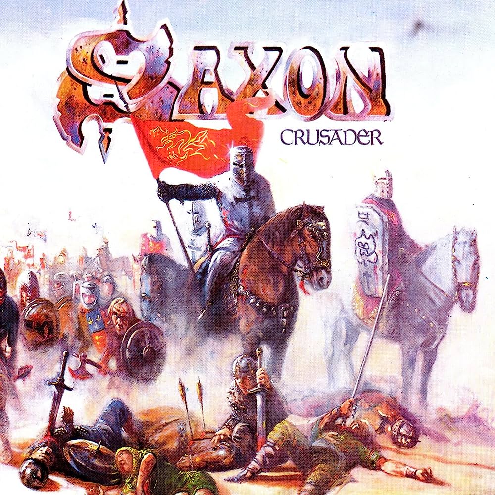 MoshPitCol's tweet photo. 🗓️ Un día como hoy pero en…

1984 | Saxon lanzó el álbum Crusader 💿

-Es uno de los discos más recordados de la era clásica de Saxon y suele citarse entre sus trabajos más importantes de los 80.
-Aunque en algunas referencias aparece como hard rock, el disco mantiene la base de heavy metal británico que hizo famoso a Saxon.
-Fue el último álbum del grupo con el sello Carrere en su etapa original.
-Es puro metal clásico: épico, potente y lleno de actitud.
-Este disco dejó himnos como Sailing to America y Just Let Me Rock.

Temas:

-The Crusader Prelude
-Crusader
-A Little Bit of What You Fancy
-Sailing to America
-Set Me Free
-Just Let Me Rock
-Bad Boys (Like to Rock ’n’ Roll)
-Do It All for You
-Rock City
-Run for Your Lives

¿Cuál es tu favorito?

#Saxon #Crusader #HeavyMetal #Rock