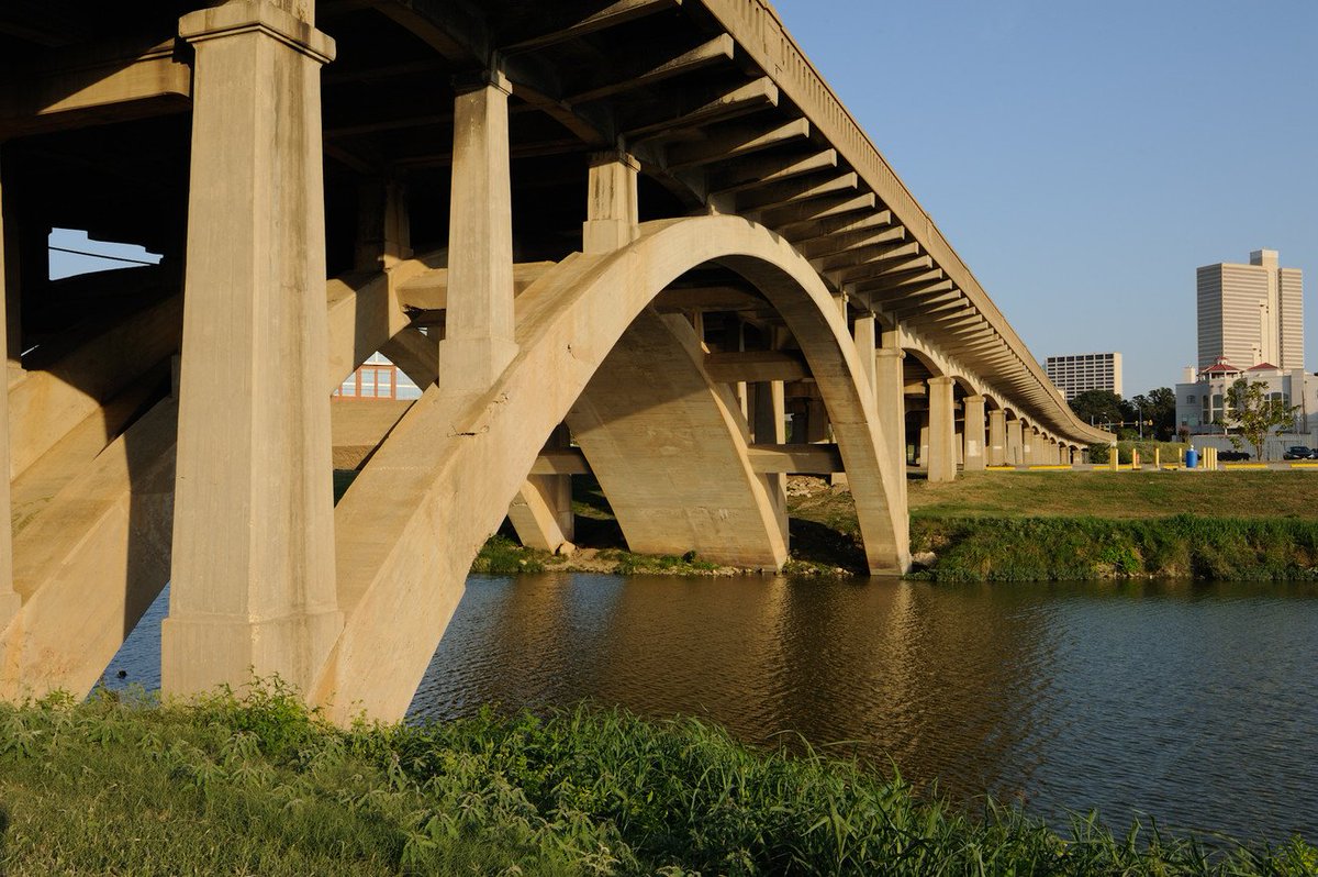 Chicotsky's tweet photo. Funded by a 1925 bond and completed in 1930, the Henderson Street Bridge crosses the Clear Fork on reinforced concrete arches linking downtown Fort Worth to the near south side. It entered the National Register of Historic Places in 2011 (Texas Historical Commission, 2011). https://t.co/zjOp1tqfyI