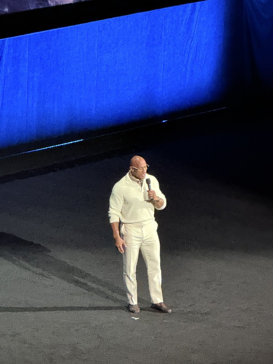 subnitmohanty's tweet image. The Rock shows a photo of his late grandfather who Maui is based on #Moana movies, at #CinemaCon 

“When you see me embodying Maui in this live-action version, every word &amp;amp; lyric that’s my grandfather”