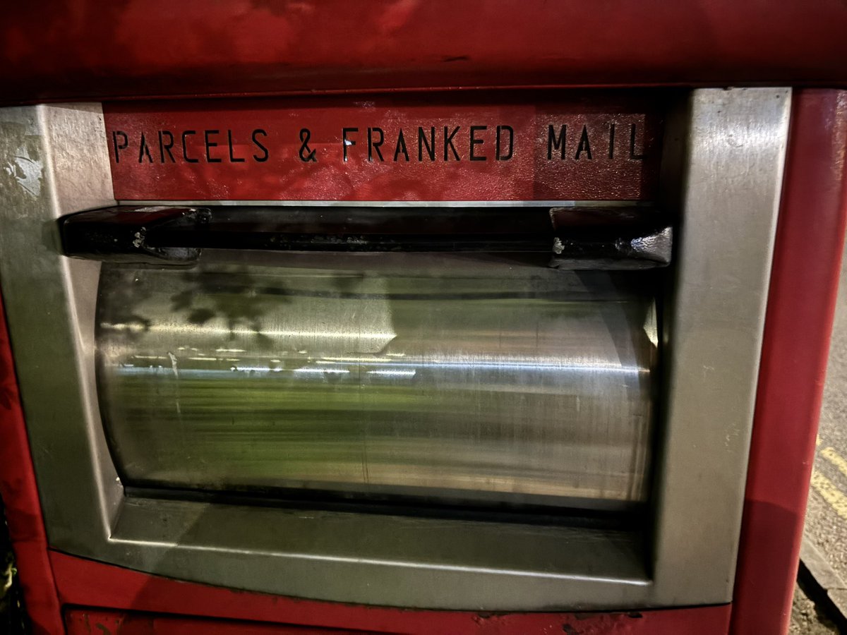 YidingC's tweet photo. @RoyalMail Trying to send a parcel and although it slide into the parcel box perfectly, after the lid was closed it was unable to re-open, presumably because the parcel didn’t drop off? I can’t find a way to dislodge it. Will it be picked up alright? https://t.co/fx0cc7Erjy