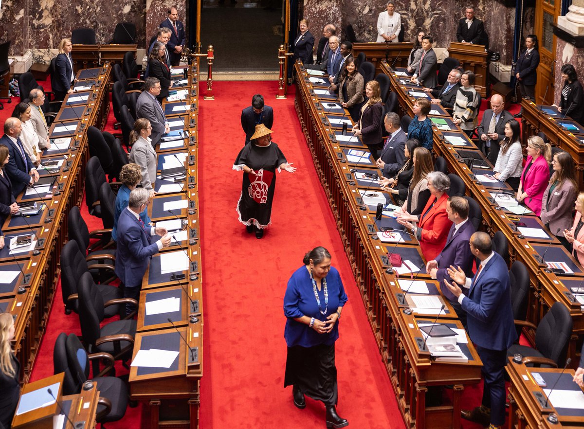 BCLegSpeaker's tweet photo. 1/2 This week @BCLegislature, @SChandraHerbert introduced two pieces of treaty legislation in the House-one with K’ómoks First Nation and the other with Kitselas First Nation.

Standing Order 25C allowed me to work with House Leaders (@mikefarnworthbc, @a_warbus, and MLA Rob Botterell) to welcome K’ómoks First Nation Chief Councillor Hegus Malidi / Nicole Rempel and Kitselas Nation Deputy Chief Councillor Cyril Bennett-Nabess to address the House, as well as to incorporate ceremonial elements supported by each Nation into the proceedings. Members were treated to a performance by the K’ómoks Cultural Group and a welcome song by Kitselas Nation Elder Tax’ayee / Anne McDames. 

Two truly momentous occasions.